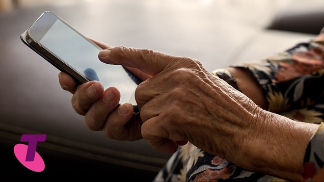 elderly person using a smartphone
